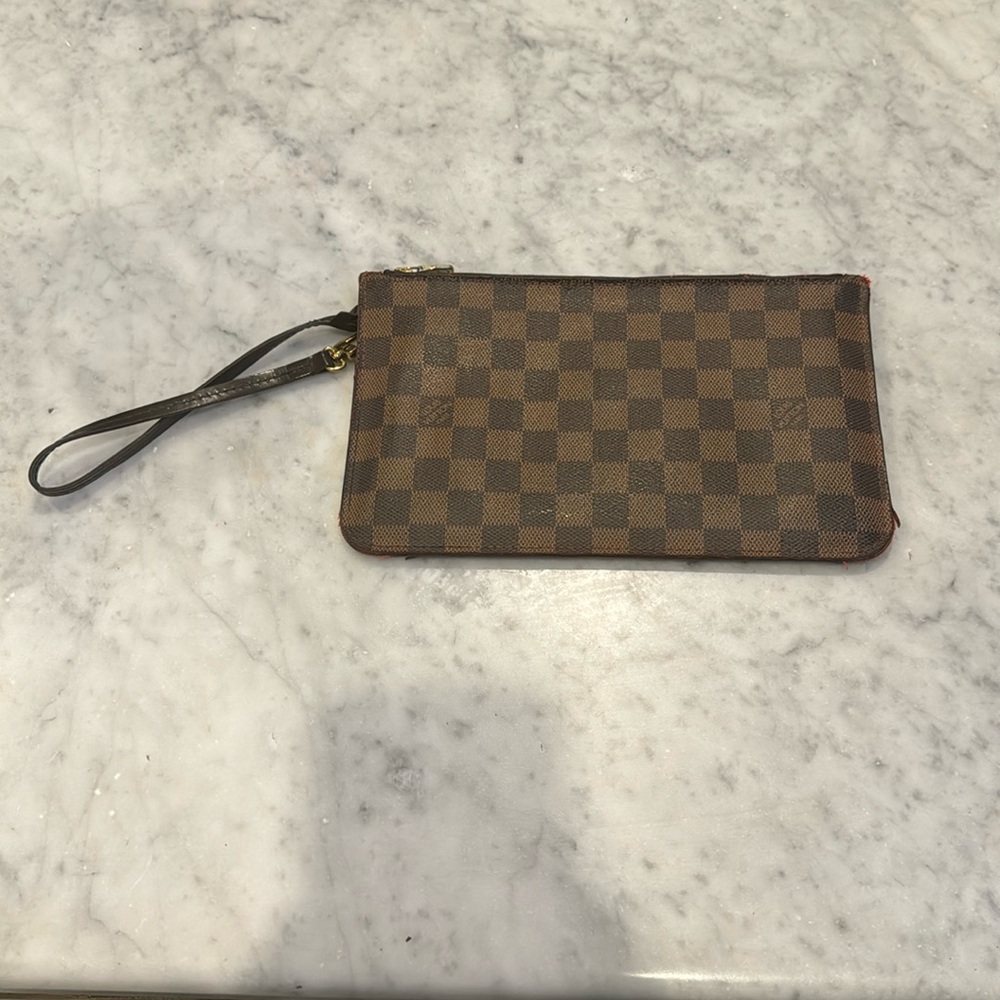 Louis Vuitton wristlet’s